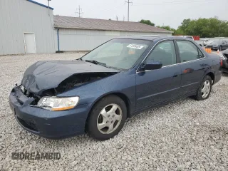 1999 Honda Accord EX with VIN JHMCG5653XC040301, listed as a Copart auction lot 57205485 with 117,676 mi miles and Salvage title. Bid and sale history available at DreamBid. Image 1.