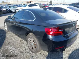 2016 BMW 2 Series 228i with VIN WBA1F9C5XGV544661, listed as a IAAI auction lot 41516695 with 84,243 mi miles. Bid and sale history available at carsss.com. Image 3.