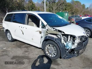 2016 Toyota Sienna XLE with VIN 5TDYK3DC4GS757607, listed as a IAAI auction lot 41749568 with 138,237 mi miles. Bid and sale history available at carsss.com. Image 1.