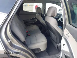 2018 Hyundai Santa Fe 2.4L with VIN 5NMZT3LB4JH069868, listed as a IAAI auction lot 42675555 with 142,612 mi miles and . Bid and sale history available at DreamBid. Image 8.