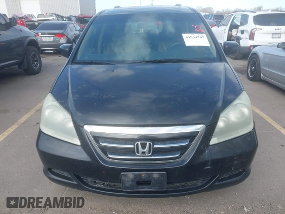 2007 Honda Odyssey EX-L with VIN 5FNRL38627B041332, listed as a IAAI auction lot 41934767 with 234,332 mi miles and . Bid and sale history available at carsss.com. Image 12.