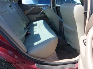 1997 Toyota Camry LE z VIN JT2BG22K3V0048428, wystawiony jako IAAI lot #41817586 z przebiegiem 349 369 mil mil oraz . Historia ofert i sprzedaży dostępna na DreamBid. Obrazek 8.