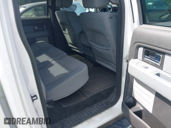 2014 Ford F-150 XL with VIN 1FTFW1ETXEFD14681, listed as a IAAI auction lot 42650184 with 133,873 mi miles and . Bid and sale history available at DreamBid. Image 8.