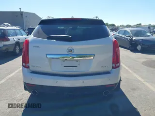 2011 Cadillac SRX Turbo Premium Collection with VIN 3GYFNKE68BS532056, listed as a IAAI auction lot 42447059 with 104,969 mi miles and . Bid and sale history available at DreamBid. Image 16.