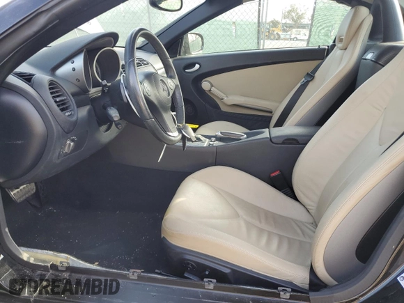 2009 Mercedes-Benz SLK-Class 3.0L with VIN WDBWK54F79F190128, listed as a Copart auction lot 80048934 with 32,354 mi miles and Salvage Title. Bid and sale history available at carsss.com. Image 7.