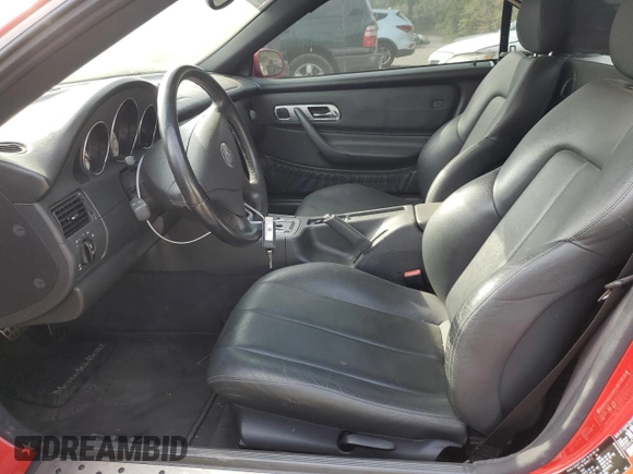 2002 Mercedes-Benz SLK-Class 2.3L Kompressor with VIN WDBKK49F22F249805, listed as a Copart auction lot 71058304 with 57,850 mi miles and Salvage Title. Bid and sale history available at carsss.com. Image 7.