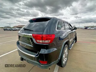 2013 Jeep Grand Cherokee Overland with VIN 1C4RJECT3DC533830, listed as a Copart auction lot 51374515 with 175,777 mi miles and Clean Title. Bid and sale history available at carsss.com. Image 4.