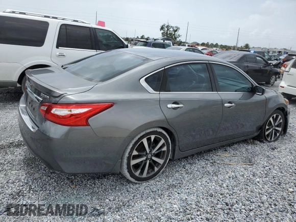 2016 Nissan Altima SR with VIN 1N4BL3AP2GC261691, listed as a Copart auction lot 59661695 with 101,846 mi miles and Salvage title. Bid and sale history available at DreamBid. Image 3.