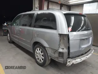 2013 Chrysler Town & Country Touring with VIN 2C4RC1BG7DR730420, listed as a IAAI auction lot 41911674 with 179,810 mi miles and . Bid and sale history available at DreamBid. Image 3.