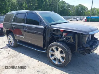 2017 Cadillac Escalade Luxury z VIN 1GYS3BKJ8HR259936, wystawiony jako IAAI lot #42301926 z przebiegiem 70 879 mil mil oraz . Historia ofert i sprzedaży dostępna na DreamBid. Obrazek 1.