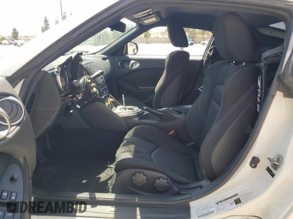 2012 Nissan 370Z z VIN JN1AZ4EH1CM562134, wystawiony jako Copart lot #56708065 z przebiegiem Nie podano mil oraz Szkoda całkowita • Salvage title. Historia ofert i sprzedaży dostępna na DreamBid. Obrazek 7.