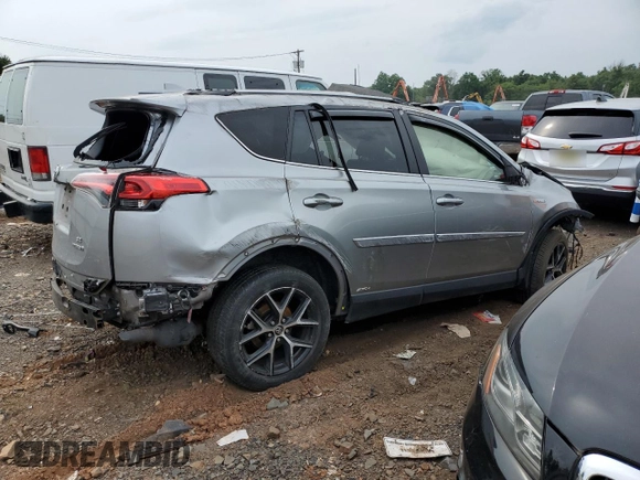 2018 Toyota RAV4 Hybrid SE with VIN JTMJJREV6JD238570, listed as a Copart auction lot 63972534 with Not provided miles and Salvage title. Bid and sale history available at DreamBid. Image 3.