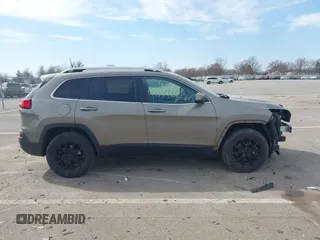 2018 Jeep Cherokee Latitude Plus with VIN 1C4PJMLXXJD571713, listed as a IAAI auction lot 41771661 with 87,580 mi miles and . Bid and sale history available at DreamBid. Image 14.