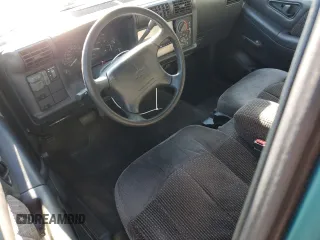 1995 GMC Sonoma SLS with VIN 1GTCS1940SK541785, listed as a Copart auction lot 80217824 with 163,374 mi miles and Salvage Title. Bid and sale history available at carsss.com. Image 8.