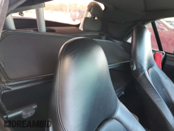 2001 Porsche 911 with VIN WP0CA29921S651773, listed as a Copart auction lot 55867785 with 111,563 mi miles and Salvage title. Bid and sale history available at DreamBid. Image 10.