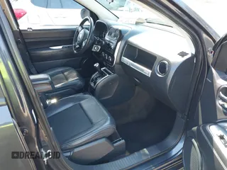 2014 Jeep Compass Latitude with VIN 1C4NJDEB3ED816351, listed as a IAAI auction lot 41882146 with 129,074 mi miles. Bid and sale history available at carsss.com. Image 5.