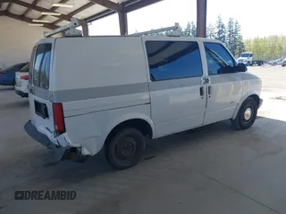 1997 Chevrolet Astro Cargo Van with VIN 1GCDM19W3VB162090, listed as a IAAI auction lot 42019388 with 238,724 mi miles. Bid and sale history available at carsss.com. Image 4.