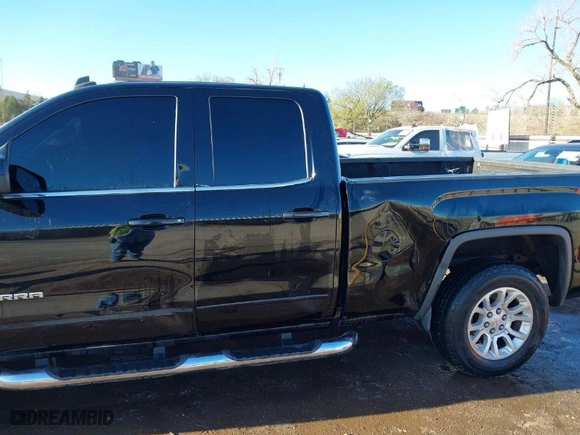 2014 GMC Sierra 1500 SLE with VIN 1GTV2UEC6EZ163992, listed as a IAAI auction lot 41788454 with 215,008 mi miles. Bid and sale history available at carsss.com. Image 6.