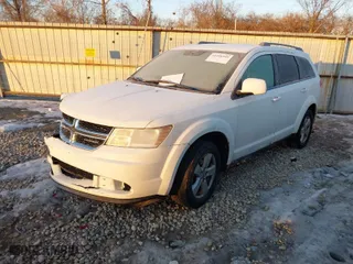 2011 Dodge Journey Mainstreet with VIN 3D4PG1FG9BT526124, listed as a IAAI auction lot 41416949 with 199,329 mi miles. Bid and sale history available at carsss.com. Image 2.