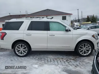2019 Ford Expedition Platinum with VIN 1FMJU1MT8KEA24308, listed as a IAAI auction lot 41510256 with 143,011 mi miles. Bid and sale history available at carsss.com. Image 13.