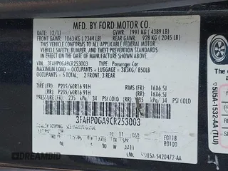 2012 Ford Fusion S with VIN 3FAHP0GA9CR253003, listed as a IAAI auction lot 42157777 with 201,966 mi miles and . Bid and sale history available at carsss.com. Image 9.