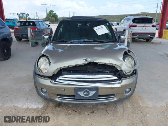 2010 MINI Convertible with VIN WMWMR3C52ATU97825, listed as a IAAI auction lot 42349417 with 64,045 mi miles and . Bid and sale history available at DreamBid. Image 12.