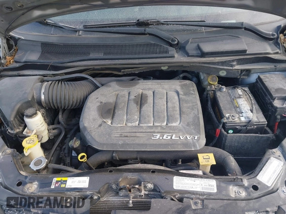 2013 Ram Cargo Van Tradesman with VIN 2C4JRGAG3DR635577, listed as a IAAI auction lot 41318833 with 187,319 mi miles and . Bid and sale history available at DreamBid. Image 10.