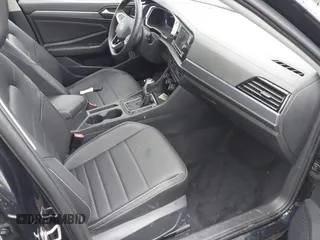 2023 Volkswagen Jetta SE with VIN 3VW7M7BUXPM038075, listed as a IAAI auction lot 42314234 with 19,490 mi miles and . Bid and sale history available at DreamBid. Image 5.