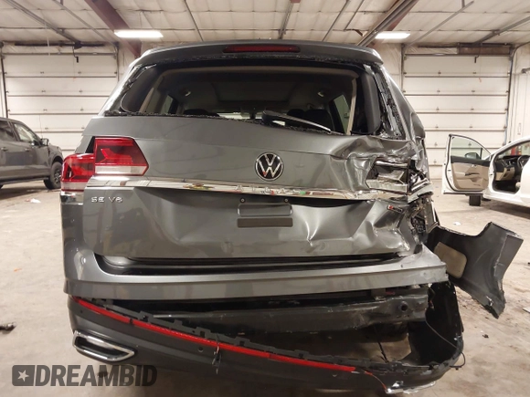 2021 Volkswagen Atlas SE z VIN 1V2KR2CA5MC606590, wystawiony jako IAAI lot #42383813 z przebiegiem 45 087 mil mil oraz . Historia ofert i sprzedaży dostępna na DreamBid. Obrazek 16.