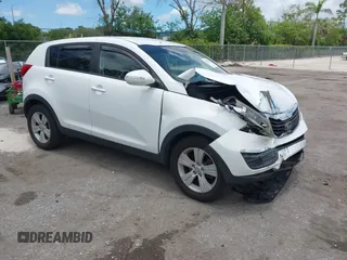 2013 Kia Sportage LX with VIN KNDPB3A23D7391619, listed as a IAAI auction lot 42578234 with 133,811 mi miles and . Bid and sale history available at DreamBid. Image 1.