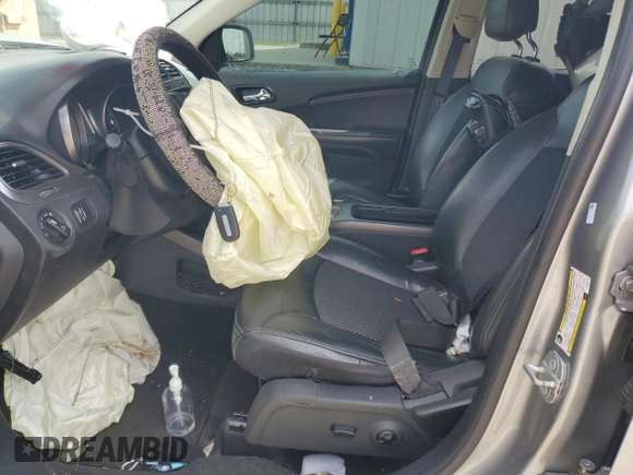 2018 Dodge Journey Crossroad with VIN 3C4PDCGG9JT344518, listed as a Copart auction lot 55796415 with 138,263 mi miles and Salvage title. Bid and sale history available at DreamBid. Image 7.