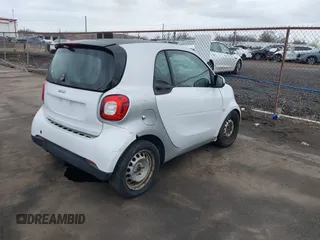 2016 Smart fortwo Passion with VIN WMEFJ5DA9GK046904, listed as a IAAI auction lot 41730029 with 143,301 mi miles and . Bid and sale history available at DreamBid. Image 4.