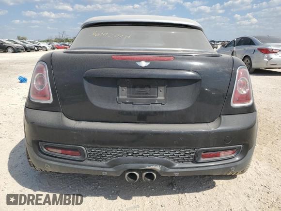 2012 MINI Coupe S z VIN WMWSX3C53CT154716, wystawiony jako Copart lot #71780654 z przebiegiem 101 260 mil mil oraz Szkoda całkowita • Salvage title. Historia ofert i sprzedaży dostępna na DreamBid. Obrazek 6.