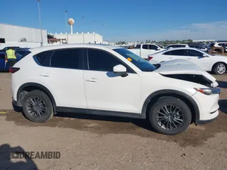 2019 Mazda CX-5 Touring with VIN JM3KFACM4K1668352, listed as a IAAI auction lot 41481291 with 65,901 mi miles and . Bid and sale history available at carsss.com. Image 13.