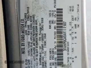 2010 Ford Fusion S with VIN 3FAHP0GA0AR111507, listed as a Copart auction lot 53186295 with 128,167 mi miles and Salvage Title. Bid and sale history available at carsss.com. Image 12.
