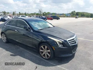 2013 Cadillac ATS Luxury with VIN 1G6AB5RX5D0154501, listed as a IAAI auction lot 41803721 with 250,976 mi miles. Bid and sale history available at carsss.com. Image 1.