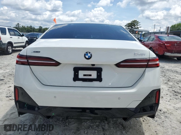 2024 BMW 5 Series 540i xDrive with VIN WBA63FJ04RCS00990, listed as a Copart auction lot 60112415 with Not provided miles and Salvage title. Bid and sale history available at DreamBid. Image 6.