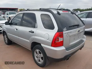 2009 Kia Sportage LX with VIN KNDJF724097567390, listed as a IAAI auction lot 42066762 with 159,946 mi miles. Bid and sale history available at carsss.com. Image 3.