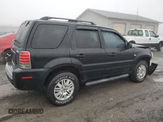 2006 Mercury Mariner Luxury с VIN 4M2CU57146KJ15124, выставлен на аукционе Copart как лот 84397234 с пробегом 232 920 миль миль и Списание • Salvage title. История ставок и продаж доступна на DreamBid. Изображение 3.