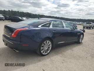 2015 Jaguar XJ Portfolio with VIN SAJWJ2GD8F8V84252, listed as a Copart auction lot 49313935 with 90,545 mi miles and Salvage title. Bid and sale history available at DreamBid. Image 3.