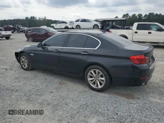 2014 BMW 5 Series 528i xDrive with VIN WBA5A7C56ED618181, listed as a Copart auction lot 73992504 with 180,563 mi miles and Salvage Title. Bid and sale history available at DreamBid. Image 2.
