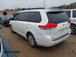 2012 Toyota Sienna LE with VIN 5TDJK3DC3CS048579, listed as a IAAI auction lot 41055074 with 202,791 mi miles. Bid and sale history available at carsss.com. Image 3.