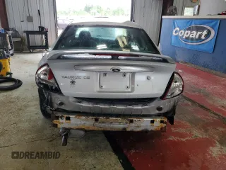 2005 Ford Taurus SE with VIN 1FAFP53215A133518, listed as a Copart auction lot 59615205 with 127,778 mi miles and Salvage title. Bid and sale history available at DreamBid. Image 6.