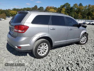 2018 Dodge Journey SXT with VIN 3C4PDCBG0JT386213, listed as a Copart auction lot 76146524 with 142,436 mi miles and Salvage Title. Bid and sale history available at carsss.com. Image 3.