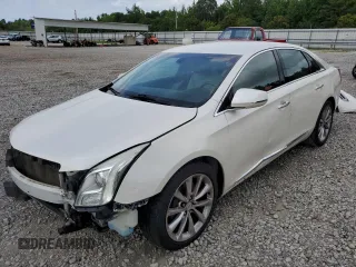 2013 Cadillac XTS Luxury with VIN 2G61P5S33D9125769, listed as a Copart auction lot 59671015 with 143,583 mi miles and Salvage title. Bid and sale history available at DreamBid. Image 1.