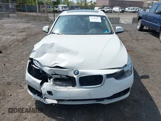 2018 BMW 3 Series 320i xDrive with VIN WBA8A3C5XJA505321, listed as a IAAI auction lot 42146927 with 47,547 mi miles and . Bid and sale history available at DreamBid. Image 13.