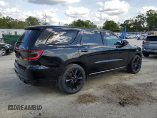 2018 Dodge Durango GT with VIN 1C4RDHDG2JC494203, listed as a Copart auction lot 50637665 with 144,777 mi miles and Salvage title. Bid and sale history available at DreamBid. Image 3.