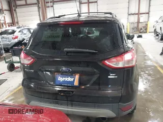 2013 Ford Escape SE with VIN 1FMCU9GX6DUC07446, listed as a IAAI auction lot 41089866 with 119,018 mi miles. Bid and sale history available at carsss.com. Image 16.