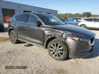 2018 Mazda CX-5 Grand Touring with VIN JM3KFBDM2J0439726, listed as a Copart auction lot 48707385 with 77,918 mi miles and Salvage Title. Bid and sale history available at carsss.com. Image 4.