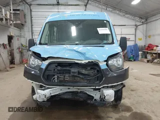 2019 Ford Transit z VIN 1FTYR2CM0KKB66383, wystawiony jako IAAI lot #42098606 z przebiegiem 325 657 mil mil oraz . Historia ofert i sprzedaży dostępna na DreamBid. Obrazek 12.